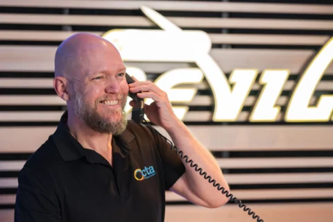 A person speaks on the phone